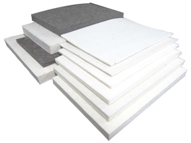 Ten pressed wool felt sheets on the white background with different thickness.