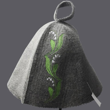 A gray sauna hat with green leaves and white small flower embroidery picture on it.