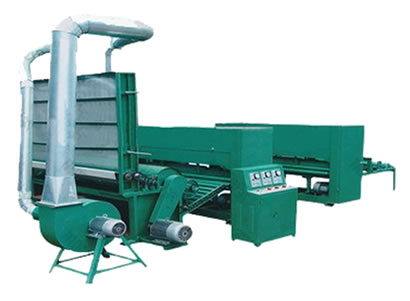 A green needle punching equipment on the white background.